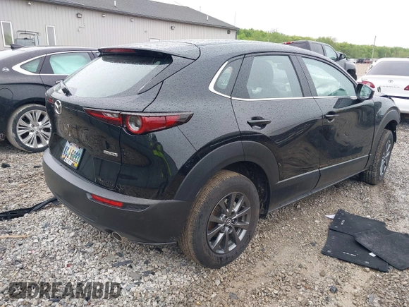 2023 Mazda CX-30 S with VIN 3MVDMBAM7PM561904, listed as a IAAI auction lot 42181907 with 15,900 mi miles and . Bid and sale history available at DreamBid. Image 4.
