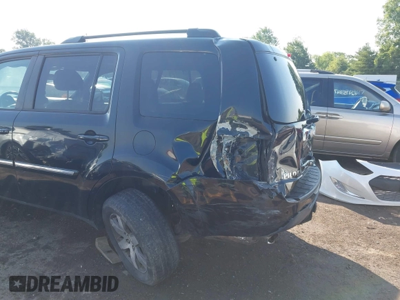 2013 Honda Pilot Touring z VIN 5FNYF4H96DB084148, wystawiony jako IAAI lot #42465066 z przebiegiem 220 339 mil mil oraz . Historia ofert i sprzedaży dostępna na DreamBid. Obrazek 6.