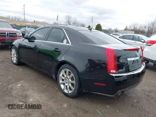 2008 Cadillac CTS RWD w/1SB with VIN 1G6DR57V580176739, listed as a IAAI auction lot 41847461 with 136,482 mi miles. Bid and sale history available at carsss.com. Image 3.