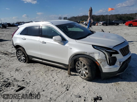 2022 Cadillac XT4 FWD Premium Luxury with VIN 1GYFZCR45NF100049, listed as a Copart auction lot 87232634 with 62,391 mi miles and Salvage title. Bid and sale history available at DreamBid. Image 4.