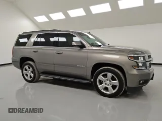 2019 Chevrolet Tahoe LT with VIN 1GNSCBKC0KR100687, listed as a Copart auction lot 53123455 with 104,006 mi miles and Clean title. Bid and sale history available at DreamBid. Image 4.