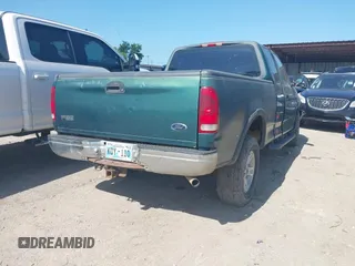 1999 Ford F-150 XL z VIN 2FTRX18L9XCA01139, wystawiony jako IAAI lot #42550053 z przebiegiem 263 950 mil mil oraz . Historia ofert i sprzedaży dostępna na DreamBid. Obrazek 4.