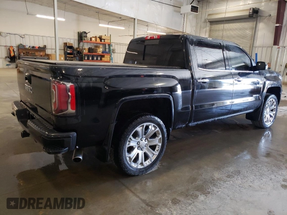 2017 GMC Sierra 1500 Denali z VIN 3GTU2PEJ7HG243799, wystawiony jako Copart lot #53297915 z przebiegiem 98 580 mil mil oraz Szkoda całkowita • Salvage title. Historia ofert i sprzedaży dostępna na DreamBid. Obrazek 3.