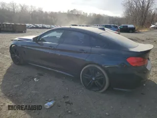 2015 BMW 4 Series 435i with VIN WBA4B1C5XFD955296, listed as a Copart auction lot 79456744 with 98,285 mi miles and Salvage Title. Bid and sale history available at DreamBid. Image 2.