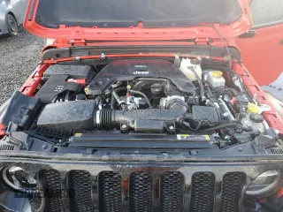 2021 Jeep Wrangler Unlimited Sport Altitude with VIN 1C4HJXDGXMW546873, listed as a Copart auction lot 44045685 with 33,592 mi miles and Salvage Title. Bid and sale history available at carsss.com. Image 11.