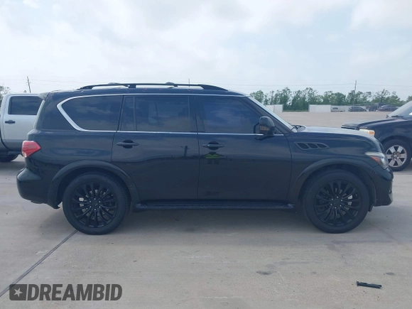 2015 Infiniti QX80 with VIN JN8AZ2ND1F9770203, listed as a IAAI auction lot 41949816 with 213,836 mi miles and . Bid and sale history available at DreamBid. Image 13.