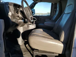 2021 Chevrolet Express Cargo with VIN 1GCWGBFP6M1268993, listed as a Copart auction lot 79764904 with 66,600 mi miles and Salvage title. Bid and sale history available at DreamBid. Image 7.
