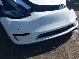 2021 Tesla Model Y Performance z VIN 5YJYGDEF0MF076263, wystawiony jako IAAI lot #42134022 z przebiegiem Nie podano mil oraz . Historia ofert i sprzedaży dostępna na DreamBid. Obrazek 21.