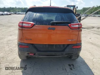 2014 Jeep Cherokee Trailhawk z VIN 1C4PJMBS4EW236608, wystawiony jako Copart lot #63672685 z przebiegiem 132 341 mil mil oraz Szkoda całkowita • Salvage title. Historia ofert i sprzedaży dostępna na DreamBid. Obrazek 6.