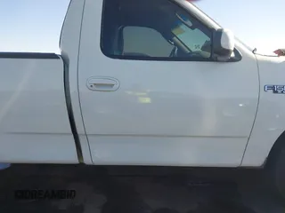2003 Ford F-150 XL with VIN 1FTRF17293NA46808, listed as a IAAI auction lot 41156923 with 384,475 mi miles and . Bid and sale history available at DreamBid. Image 13.
