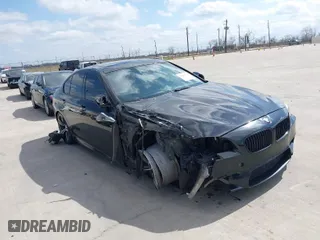 2013 BMW M5 with VIN WBSFV9C54DD095547, listed as a IAAI auction lot 41601733 with 1 mi miles. Bid and sale history available at carsss.com. Image 1.