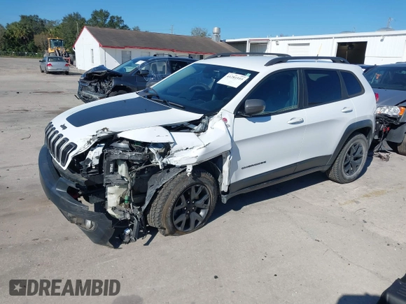 2018 Jeep Cherokee Trailhawk z VIN 1C4PJMBX8JD562994, wystawiony jako IAAI lot #41281555 z przebiegiem 86 702 mil mil oraz . Historia ofert i sprzedaży dostępna na DreamBid. Obrazek 18.