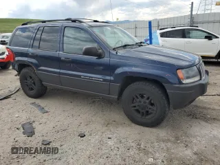 2004 Jeep Grand Cherokee Laredo with VIN 1J4GW48S04C125931, listed as a Copart auction lot 59972695 with 198,403 mi miles and Salvage title. Bid and sale history available at DreamBid. Image 4.