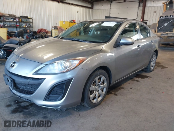 2011 Mazda Mazda3 i Sport with VIN JM1BL1UG2B1492573, listed as a IAAI auction lot 41718773 with 151,593 mi miles. Bid and sale history available at carsss.com. Image 2.