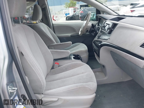 2014 Toyota Sienna LE with VIN 5TDJK3DC1ES080711, listed as a IAAI auction lot 41910679 with 118,788 mi miles and . Bid and sale history available at DreamBid. Image 5.