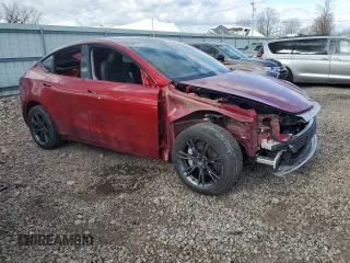 2024 Tesla Model Y Long Range z VIN 7SAYGDEE8RA302077, wystawiony jako Copart lot #52622465 z przebiegiem 11 830 mil mil oraz Szkoda całkowita • Salvage title. Historia ofert i sprzedaży dostępna na DreamBid. Obrazek 4.