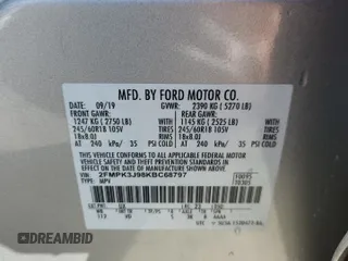 2019 Ford Edge SEL z VIN 2FMPK3J98KBC68797, wystawiony jako Copart lot #63033615 z przebiegiem 50 491 mil mil oraz Szkoda całkowita • Salvage title. Historia ofert i sprzedaży dostępna na DreamBid. Obrazek 14.