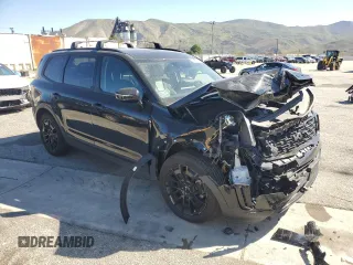 2022 Kia Telluride SX with VIN 5XYP5DHC0NG242472, listed as a Copart auction lot 43958185 with 57,604 mi miles and Salvage title. Bid and sale history available at DreamBid. Image 4.