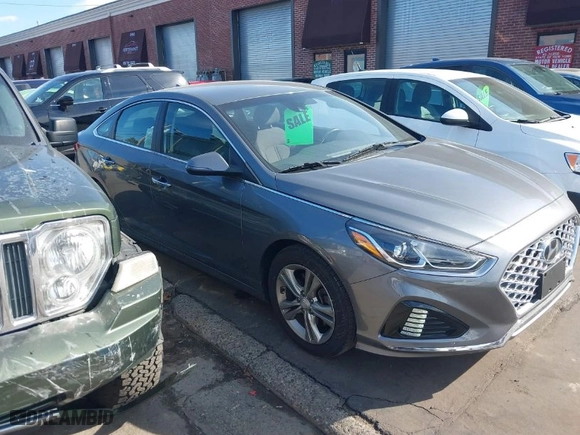 2019 Hyundai Sonata Sport with VIN 5NPE34AF5KH815856, listed as a IAAI auction lot 41687468 with 59,030 mi miles. Bid and sale history available at carsss.com. Image 13.