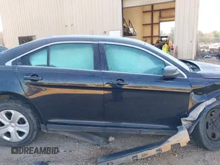 2014 Ford Police Interceptor z VIN 1FAHP2MK3EG124483, wystawiony jako IAAI lot #41018811 z przebiegiem 200 626 mil mil oraz . Historia ofert i sprzedaży dostępna na DreamBid. Obrazek 13.