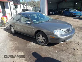 2004 Mercury Sable LS Premium with VIN 1MEHM55S54G607845, listed as a IAAI auction lot 41812758 with 200,883 mi miles. Bid and sale history available at carsss.com. Image 1.