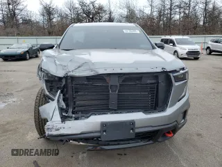 2024 GMC Acadia AWD AT4 z VIN 1GKENPKS5RJ159106, wystawiony jako Copart lot #52186485 z przebiegiem 20 704 mil mil oraz Szkoda całkowita • Salvage title. Historia ofert i sprzedaży dostępna na DreamBid. Obrazek 5.