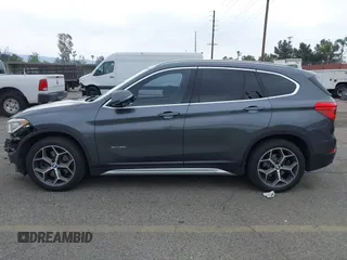2016 BMW X1 xDrive28i with VIN WBXHT3C32GP886084, listed as a IAAI auction lot 41895754 with 85,662 mi miles and . Bid and sale history available at DreamBid. Image 15.