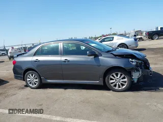2009 Toyota Corolla with VIN 1NXBU40E69Z034459, listed as a IAAI auction lot 42095649 with 173,296 mi miles. Bid and sale history available at carsss.com. Image 13.
