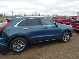 2024 Cadillac XT4 AWD Premium Luxury with VIN 1GYFZDR45RF143981, listed as a IAAI auction lot 42032787 with 14,700 mi miles and . Bid and sale history available at DreamBid. Image 13.