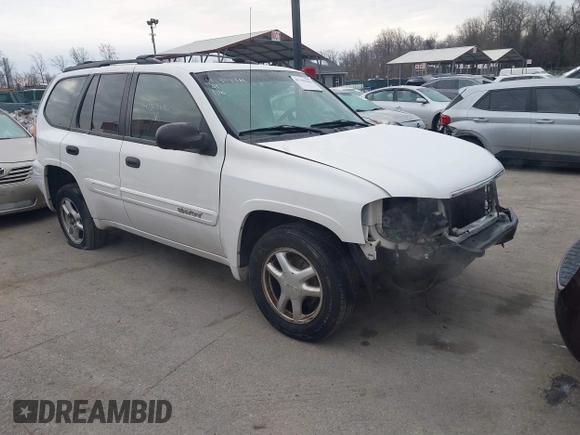 2005 GMC Envoy SLT with VIN 1GKDT13S952190876, listed as a IAAI auction lot 41308686 with 244,774 mi miles. Bid and sale history available at carsss.com. Image 1.