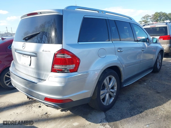 2011 Mercedes-Benz GL-Class GL 450 with VIN 4JGBF7BE1BA660453, listed as a IAAI auction lot 41852431 with 143,084 mi miles. Bid and sale history available at carsss.com. Image 4.