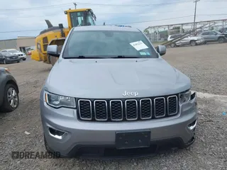 2018 Jeep Grand Cherokee Laredo E with VIN 1C4RJFAG5JC377197, listed as a IAAI auction lot 42432131 with 58,981 mi miles and . Bid and sale history available at DreamBid. Image 12.
