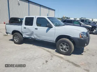 2003 Nissan Frontier XE with VIN 1N6ED27T23C456197, listed as a Copart auction lot 57393515 with 181,596 mi miles and Salvage title. Bid and sale history available at DreamBid. Image 4.