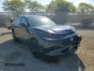 2023 Mazda CX-30 S Premium with VIN 3MVDMBDM7PM543849, listed as a Copart auction lot 54852415 with 20,898 mi miles and Salvage title. Bid and sale history available at DreamBid. Image 14.