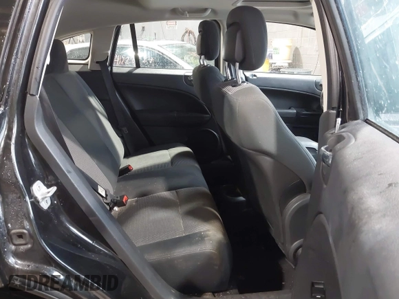 2011 Dodge Caliber Rush with VIN 1B3CB8HB5BD108767, listed as a IAAI auction lot 41820107 with 145,101 mi miles. Bid and sale history available at carsss.com. Image 8.