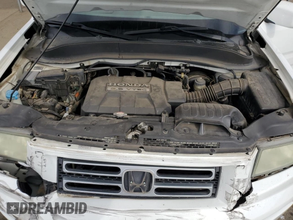 2006 Honda Ridgeline RTL with VIN 2HJYK16506H570523, listed as a Copart auction lot 75746474 with 142,694 mi miles and Salvage Title. Bid and sale history available at carsss.com. Image 11.