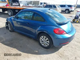 2018 Volkswagen Beetle S with VIN 3VWFD7AT9JM712664, listed as a IAAI auction lot 41634663 with 72,649 mi miles. Bid and sale history available at carsss.com. Image 3.