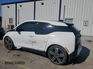 2014 BMW i3 with VIN WBY1Z4C51EV276642, listed as a Copart auction lot 52571115 with 112,178 mi miles and Salvage title. Bid and sale history available at DreamBid. Image 2.