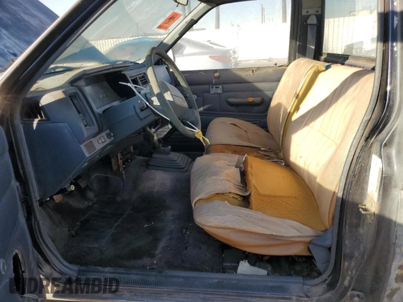 1991 Nissan Frontier z VIN 1N6SD11S2MC350332, wystawiony jako Copart lot #87462534 z przebiegiem 350 692 mil mil oraz Szkoda całkowita • Salvage title. Historia ofert i sprzedaży dostępna na DreamBid. Obrazek 7.