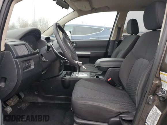 2011 Mitsubishi Endeavor LS with VIN 4A4JN2AS6BE032693, listed as a Copart auction lot 86910564 with 130,097 mi miles and Salvage Title. Bid and sale history available at carsss.com. Image 7.