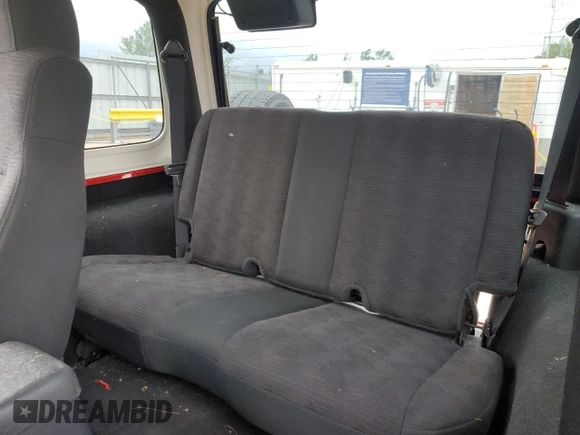 2005 Jeep Wrangler Sport z VIN 1J4FA49S75P317995, wystawiony jako Copart lot #58060055 z przebiegiem 189 332 mil mil oraz Szkoda całkowita • Salvage title. Historia ofert i sprzedaży dostępna na DreamBid. Obrazek 10.