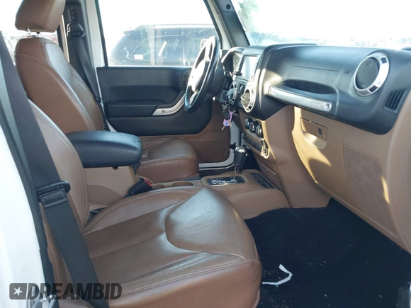 2017 Jeep Wrangler Unlimited Sahara with VIN 1C4BJWEG0HL587163, listed as a IAAI auction lot 41252399 with 84,983 mi miles. Bid and sale history available at carsss.com. Image 5.