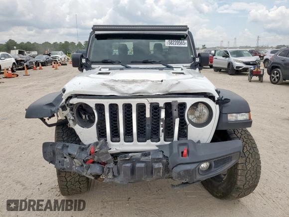 2023 Jeep Gladiator Rubicon with VIN 1C6JJTBG8PL532271, listed as a Copart auction lot 58220565 with 34,172 mi miles and Salvage title. Bid and sale history available at DreamBid. Image 5.