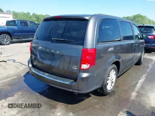 2015 Dodge Grand Caravan SXT with VIN 2C4RDGCG4FR631362, listed as a IAAI auction lot 42027066 with 149,599 mi miles and . Bid and sale history available at DreamBid. Image 4.
