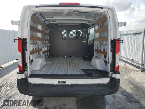 2023 Ford Transit Cargo with VIN 1FTBR1Y82PKB56604, listed as a Copart auction lot 50419485 with 24,546 mi miles and Clean Title. Bid and sale history available at DreamBid. Image 6.