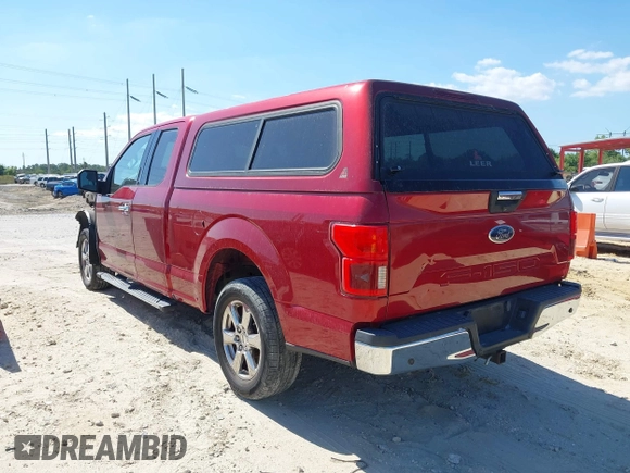 2018 Ford F-150 XL z VIN 1FTEX1C5XJKD87760, wystawiony jako IAAI lot #42016828 z przebiegiem 121 297 mil mil oraz . Historia ofert i sprzedaży dostępna na DreamBid. Obrazek 3.
