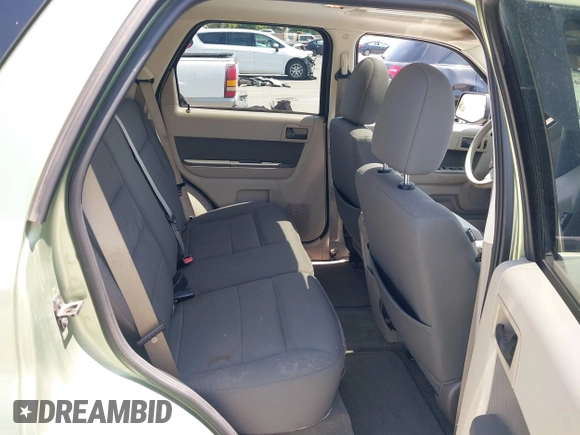 2009 Ford Escape Hybrid z VIN 1FMCU49329KA08605, wystawiony jako IAAI lot #42367265 z przebiegiem 166 562 mil mil oraz . Historia ofert i sprzedaży dostępna na DreamBid. Obrazek 8.