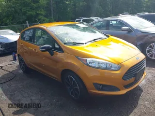2016 Ford Fiesta SE z VIN 3FADP4EJ7GM205009, wystawiony jako IAAI lot #42244321 z przebiegiem 133 350 mil mil oraz . Historia ofert i sprzedaży dostępna na DreamBid. Obrazek 1.