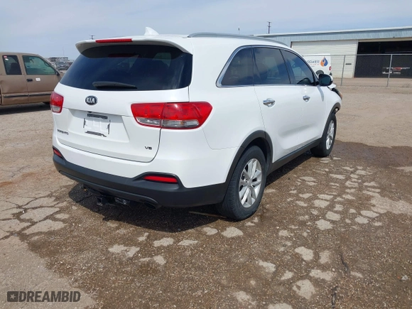 2016 Kia Sorento LX with VIN 5XYPG4A51GG023545, listed as a IAAI auction lot 41923123 with 168,438 mi miles. Bid and sale history available at carsss.com. Image 3.