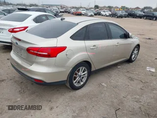 2018 Ford Focus SE with VIN 1FADP3F27JL295790, listed as a IAAI auction lot 41613228 with 158,783 mi miles. Bid and sale history available at carsss.com. Image 4.